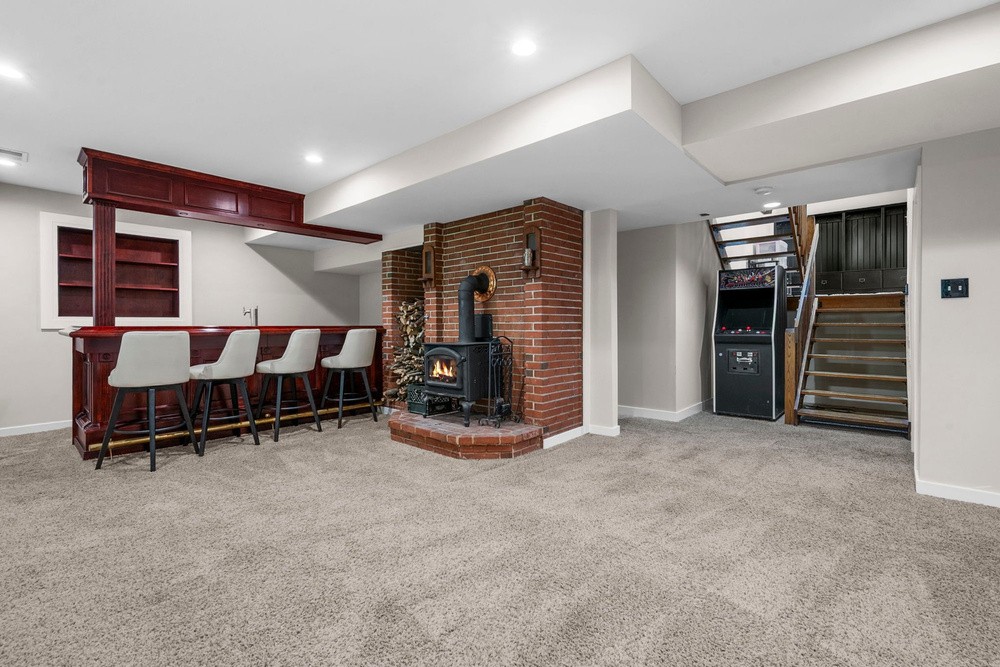 Lower level recreation room with the custom bar