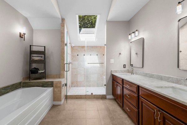 En suite bath &mdash; walk-in shower and soaking tub