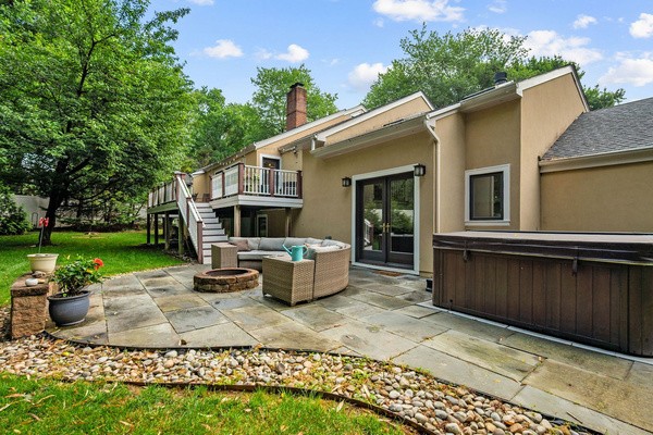 Patio, fire pit and hot tub on 1.1 private acres